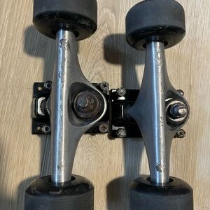 Skateboard trucks and wheels